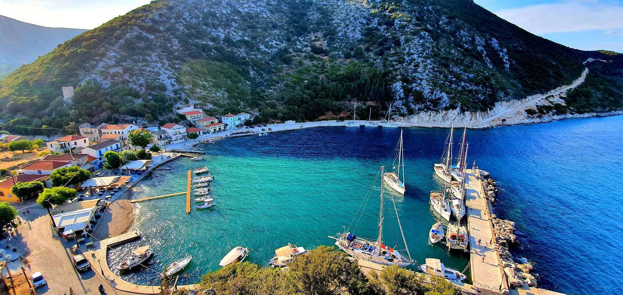 Panoramic view of Frikes harbour in Northern Ithaca, a picturesque destination for private boat day trips from Kefalonia